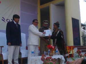 Sonitpur ANM Mrs Elizabeth Tigga being felicitated by state minister Tanka Rai Bahadur