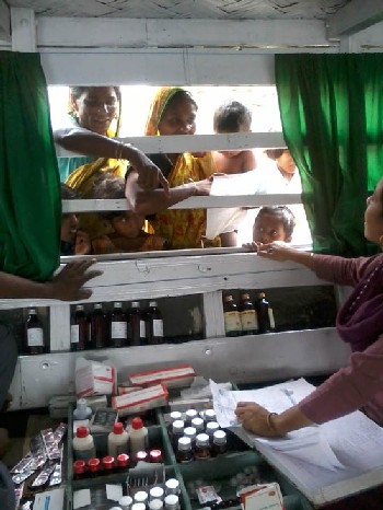 Medicines being dispensed to the beneficiaries from the Boat Clinic at Barpeta