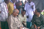 Chaman Lal, C-NES Trustee and former Special Rapporteur at the National Human Rights Commission, also former DGP, Nagaland,on a boat clinic review mission  in May 2009. Seen here( sitting left) at Barpeta with local panchayat menmbersand villagers and associate Programme manger Sanjay Sharma (seated right)
