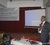 dr. sinha presents his paper.jpg