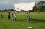 A tent being pitched for the health camp in Bhekeli sapori, Majuli, Jorhat