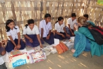 Sara Poelhman, Education Specialist, UNICEF India  interacting with girl students at the Lowkiwali feeder school.