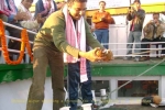 Shekhar Aiyar smashing a coconut on the occasion at SB â€œShahnazâ€                        