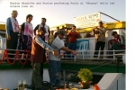 Rustom Aiyar preforms Pooja on board the SB â€œShahnazâ€ looked on by Mr Hazarika and his parents( from above) at Maijan Ghat.